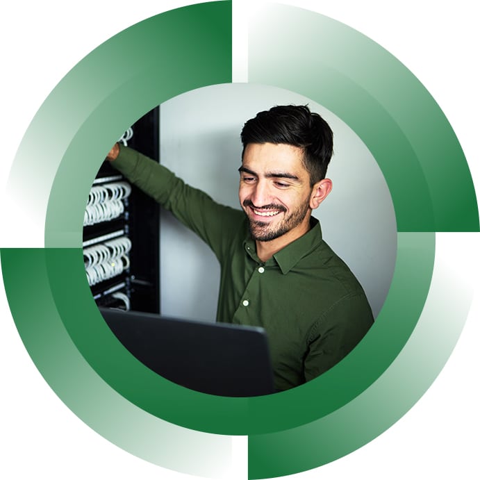 man working in server room